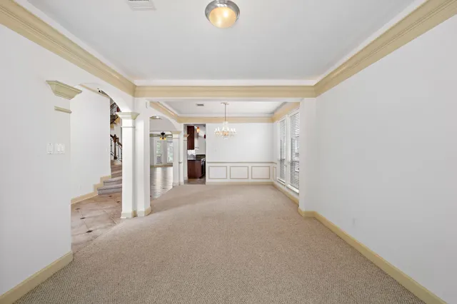 a view of a livingroom with a staircase