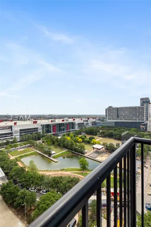 a view of swimming pool from a balcony