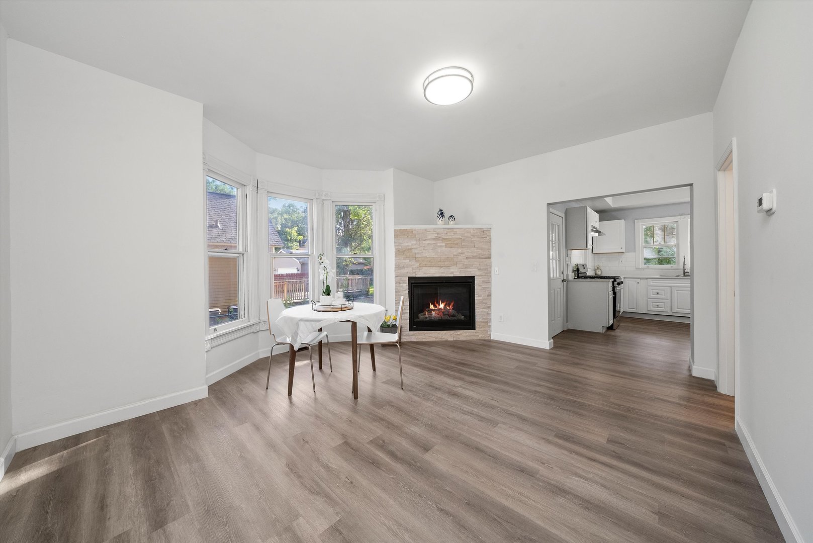 628 South Liberty Street Elgin, IL 60120 - Photo 4 of 22 a view of a livingroom with furniture and a fireplace