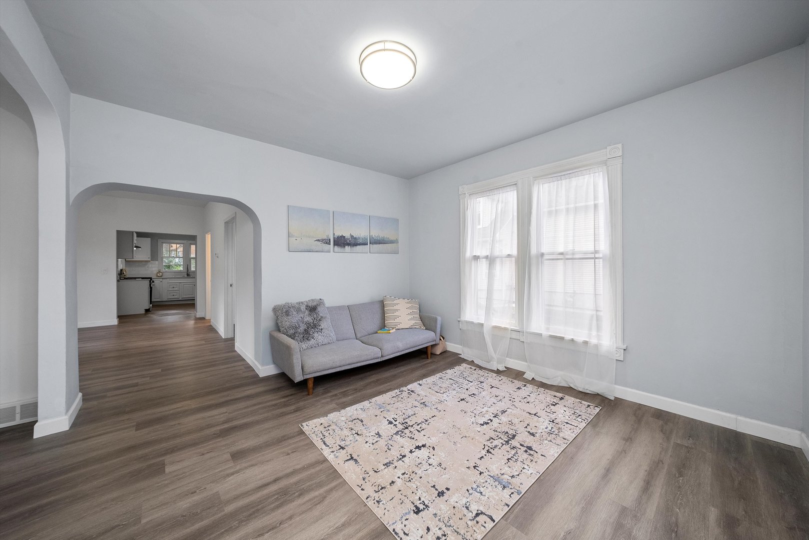 628 South Liberty Street Elgin, IL 60120 - Photo 7 of 22 wooden floor with an empty room and window