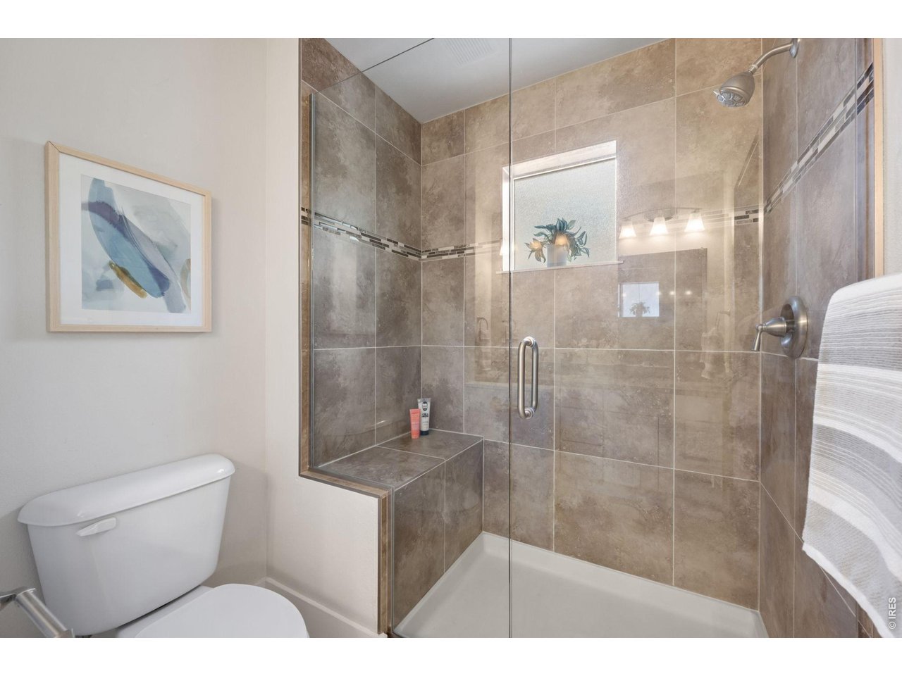 812 East Baseline Road, Unit B Lafayette, CO 80026 - Photo 23 of 44 Large Shower in Primary Bath with built in bench