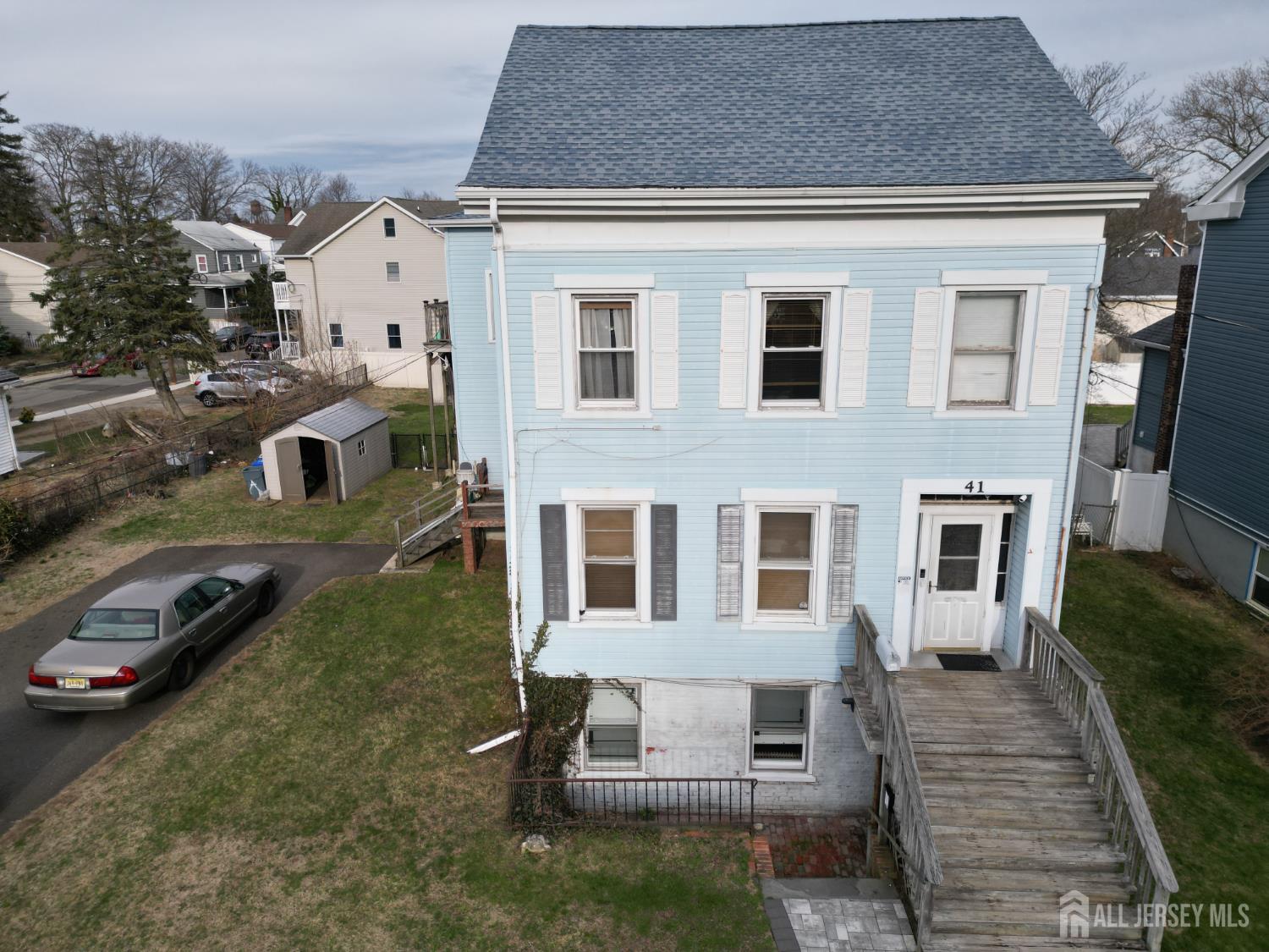 41 Atlantic Street Keyport, NJ 07735 - Photo 2 of 48 a view of a house with a yard