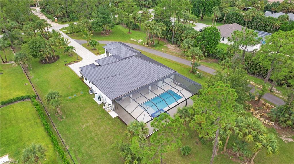 652 15th Street Southwest Naples, FL 34117 - Photo 30 of 47 an aerial view of a house