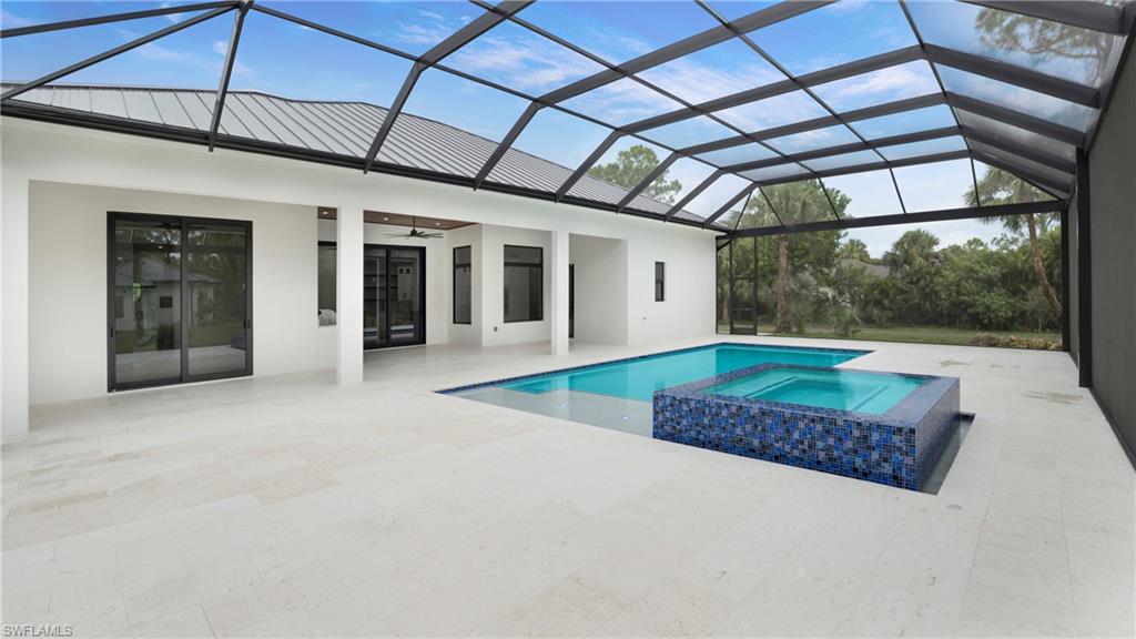 652 15th Street Southwest Naples, FL 34117 - Photo 32 of 47 a very nice looking room with a fireplace