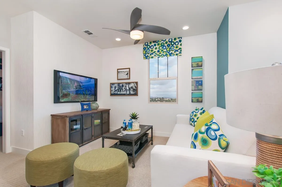 1189 Via Candelas Oceanside, CA 92056 - Photo 15 of 21 a view of a dining room with furniture and a chandelier