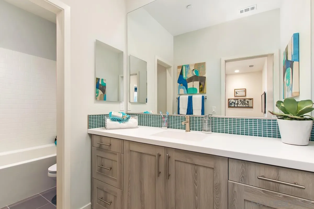 1189 Via Candelas Oceanside, CA 92056 - Photo 18 of 21 a bathroom with a sink and a bathtub