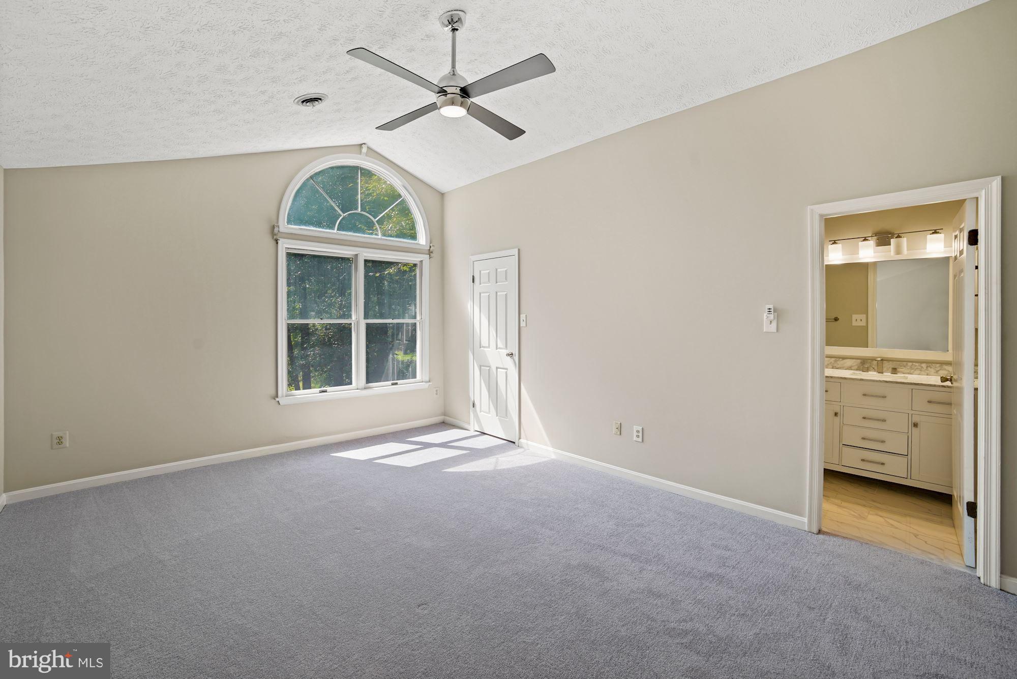 9304 Spring Water Path Jessup, MD 20794 - Photo 16 of 34 Primary Bedroom
