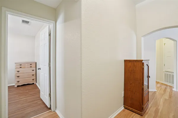 a view of a hallway with elevator