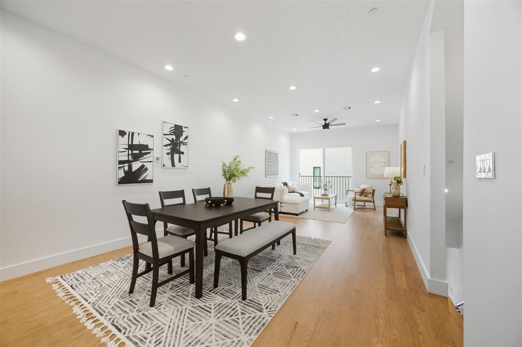 4517 Munger Avenue, Unit 101 Dallas, TX 75204 - Photo 32 of 39 a view of a dining room with furniture