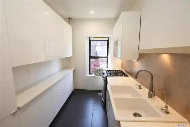 a bathroom with a sink and a bathtub