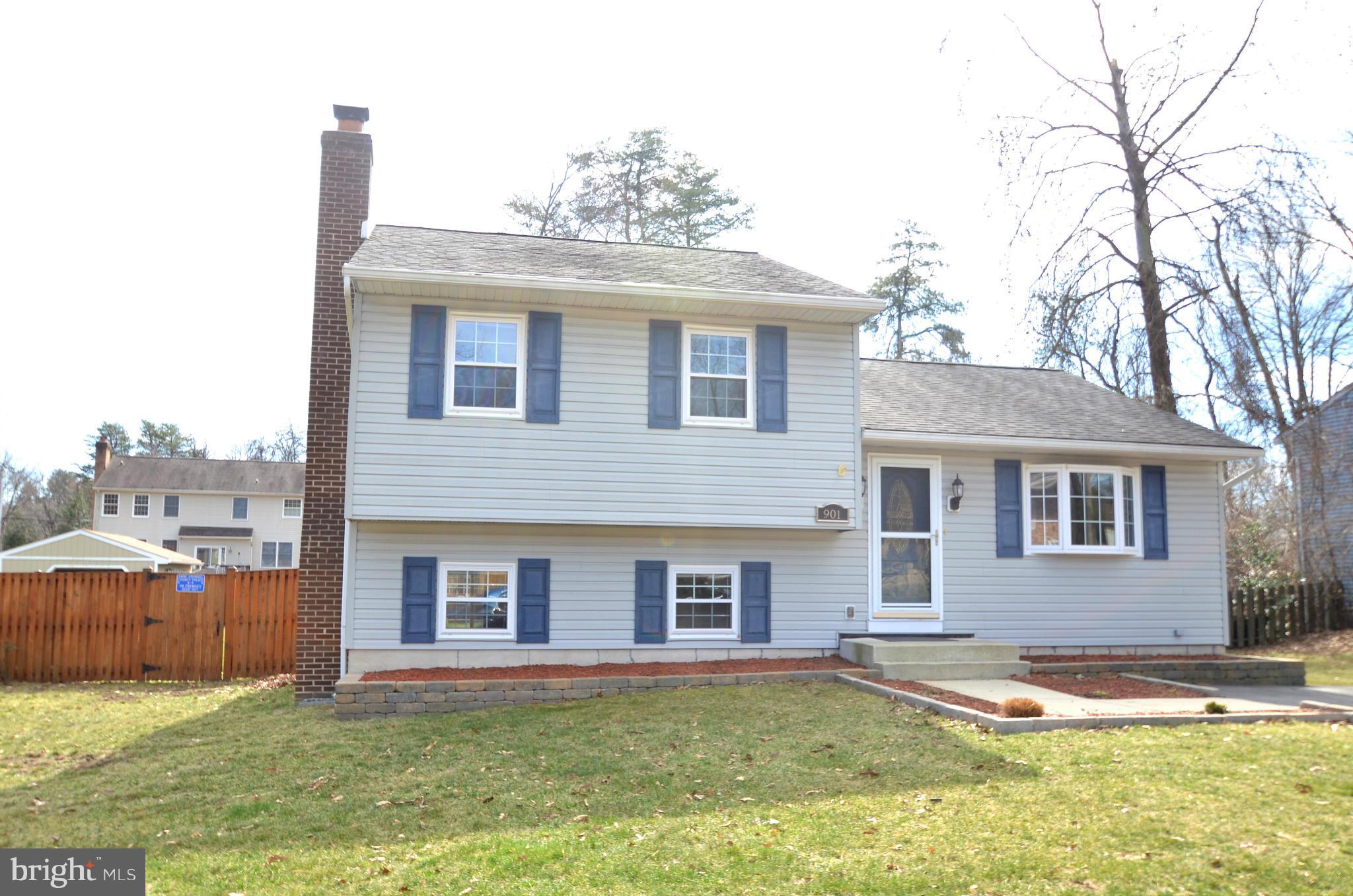901 Beech Tree Road Severn, MD 21144 - Photo 2 of 27 a front view of a house with a yard
