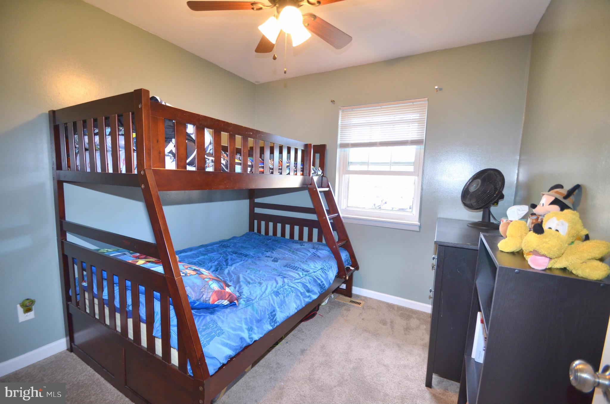 901 Beech Tree Road Severn, MD 21144 - Photo 14 of 27 a bedroom with furniture and a window