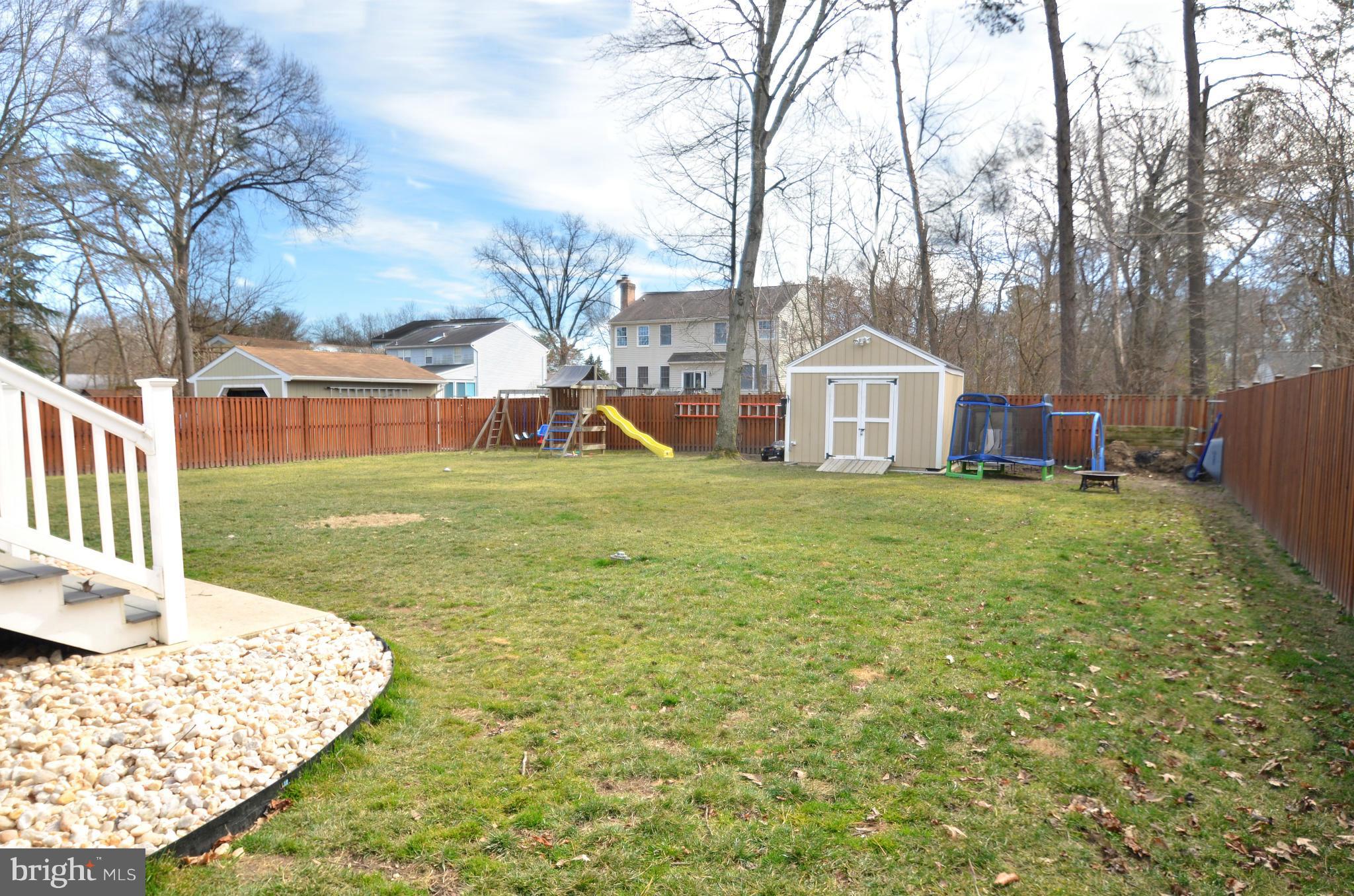 901 Beech Tree Road Severn, MD 21144 - Photo 27 of 27 a view of a house with a yard
