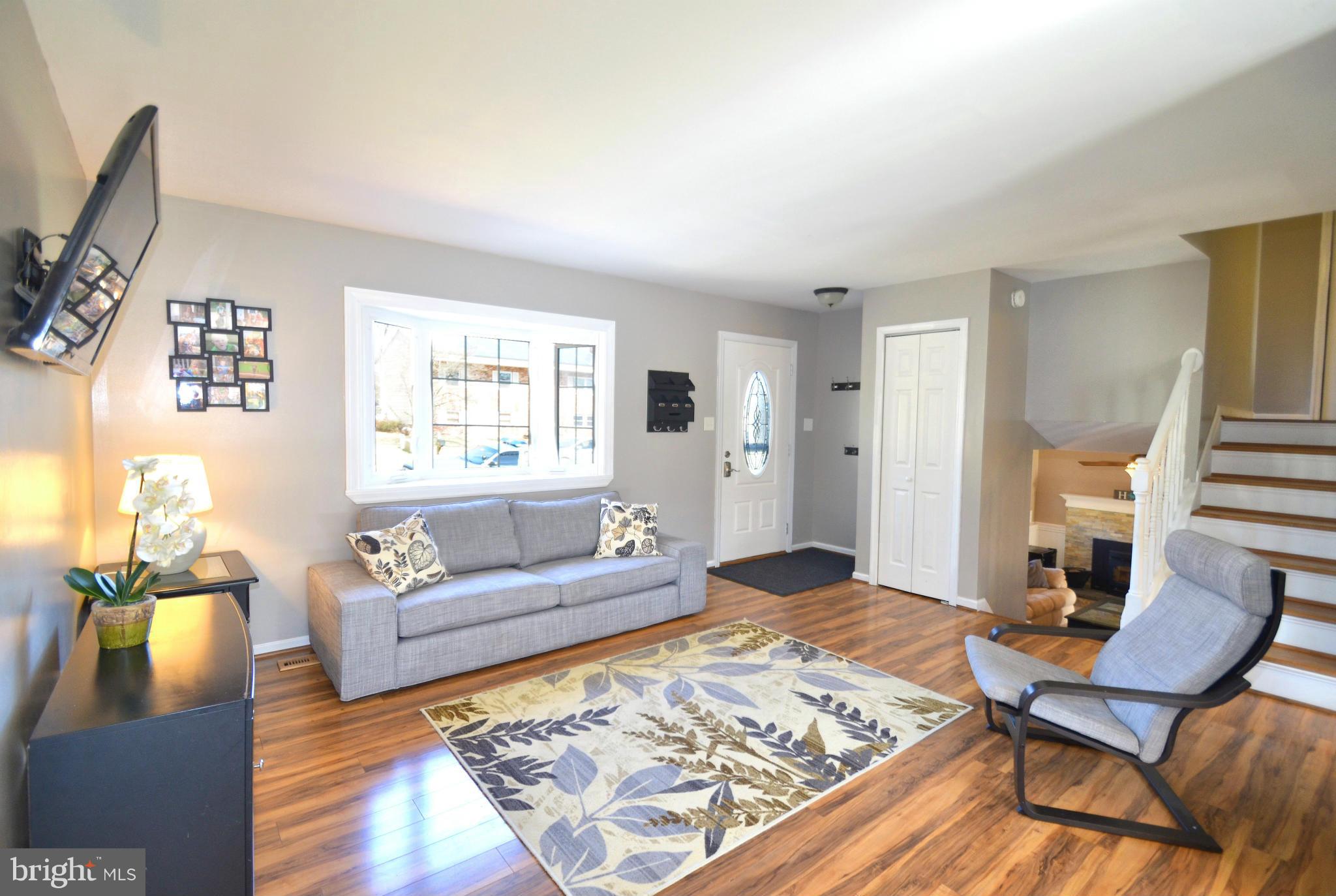 901 Beech Tree Road Severn, MD 21144 - Photo 5 of 27 a living room with furniture rug and window