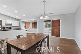 20726 Nisqually Road Apple Valley, CA 92308 - Photo 9 of 16 a view of kitchen and dining area with furniture