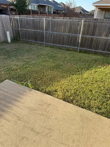 a view of outdoor space and yard