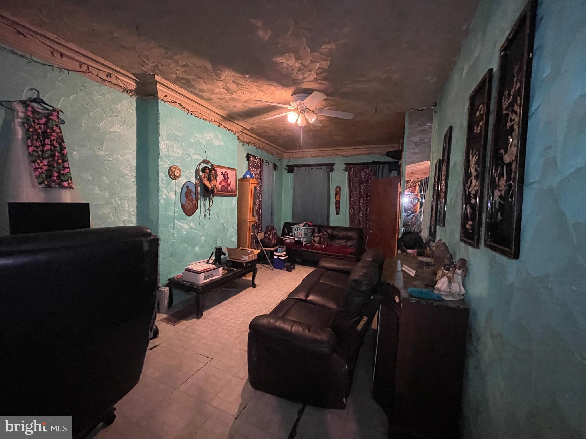 23 North 58th Street Philadelphia, PA 19139 - Photo 4 of 7 a living room with furniture and a flat screen tv