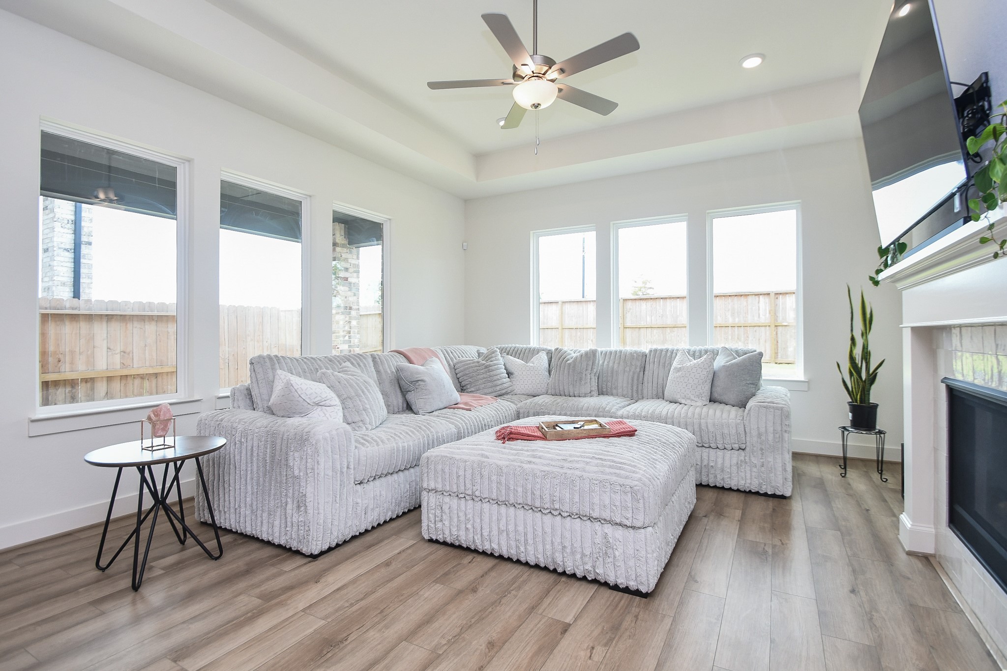 31915 Sky Rdg Lane Fulshear, TX 77441 - Photo 13 of 38 Enjoy the welcoming comfort of this living room, designed to create a warm and cozy atmosphere.