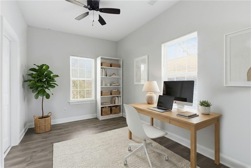 73 Atlanta Avenue Southwest Atlanta, GA 30315 - Photo 17 of 26 a view of a workspace with furniture and a potted plant