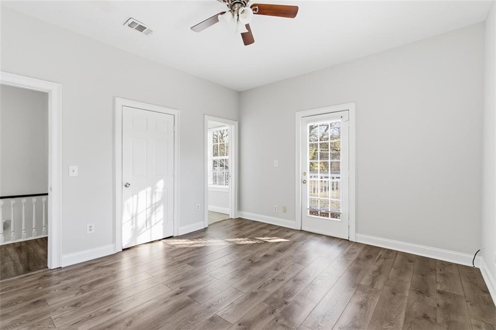 73 Atlanta Avenue Southwest Atlanta, GA 30315 - Photo 20 of 26 wooden floor in an empty room with a window