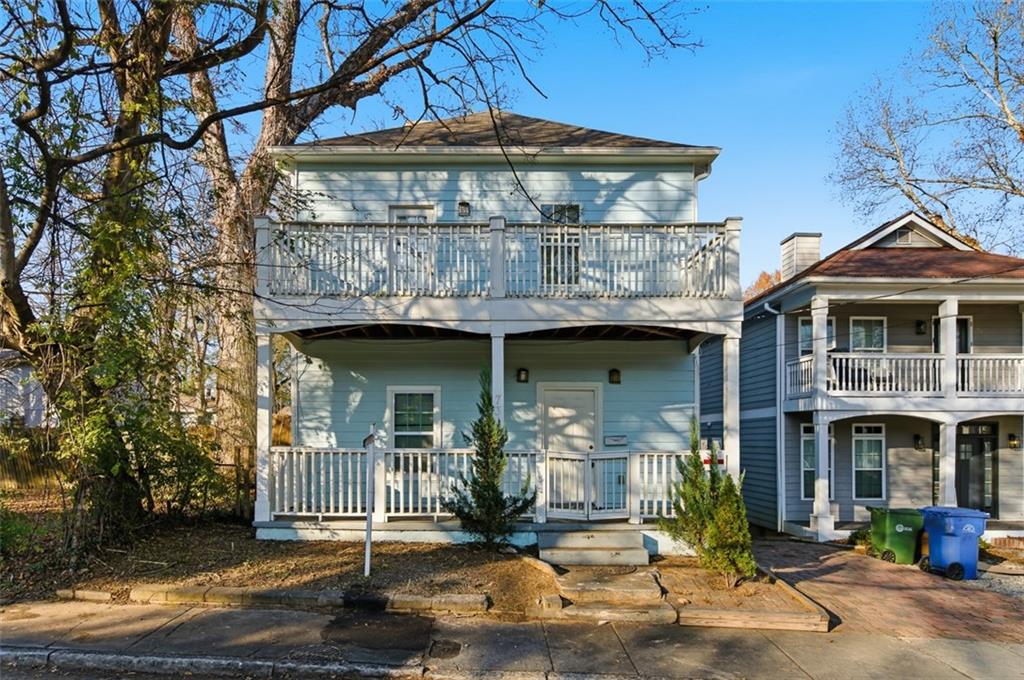 73 Atlanta Avenue Southwest Atlanta, GA 30315 - Photo 2 of 26 a front view of a house with porch