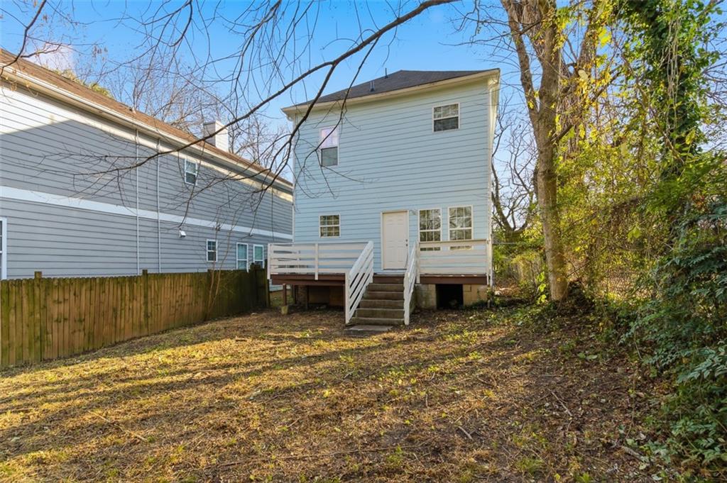 73 Atlanta Avenue Southwest Atlanta, GA 30315 - Photo 26 of 26 a view of a house with a yard