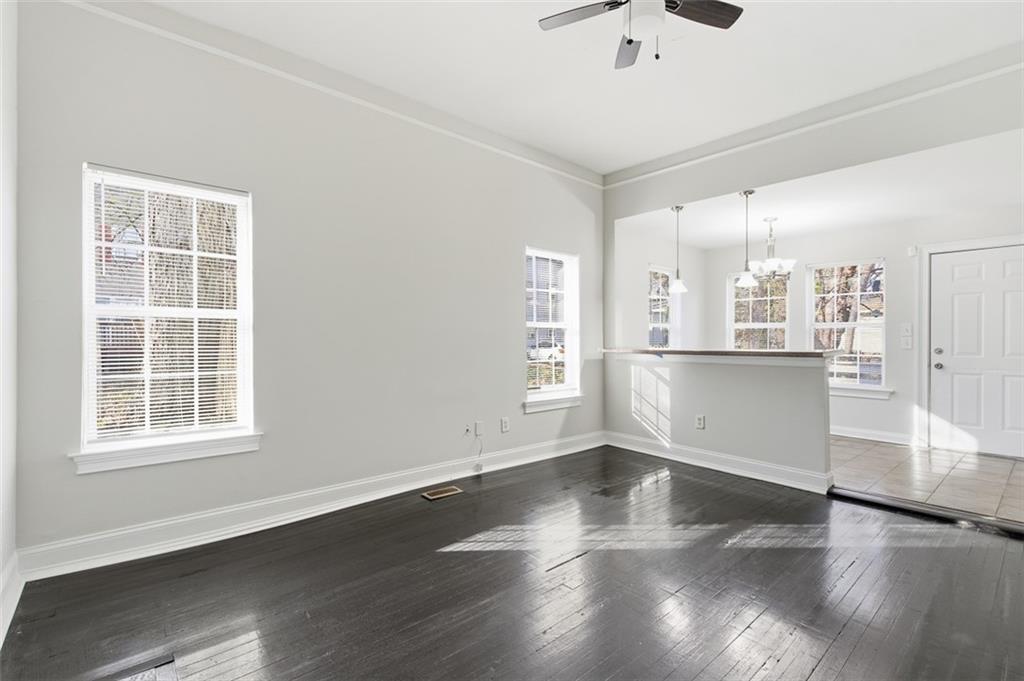 73 Atlanta Avenue Southwest Atlanta, GA 30315 - Photo 6 of 26 wooden floor in an empty room with a window