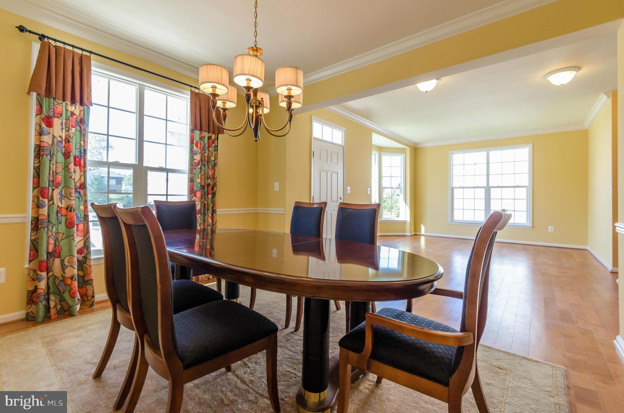 6517 Clarington Road Baltimore, MD 21209 - Photo 6 of 30 a view of a dining room with furniture window and outside view