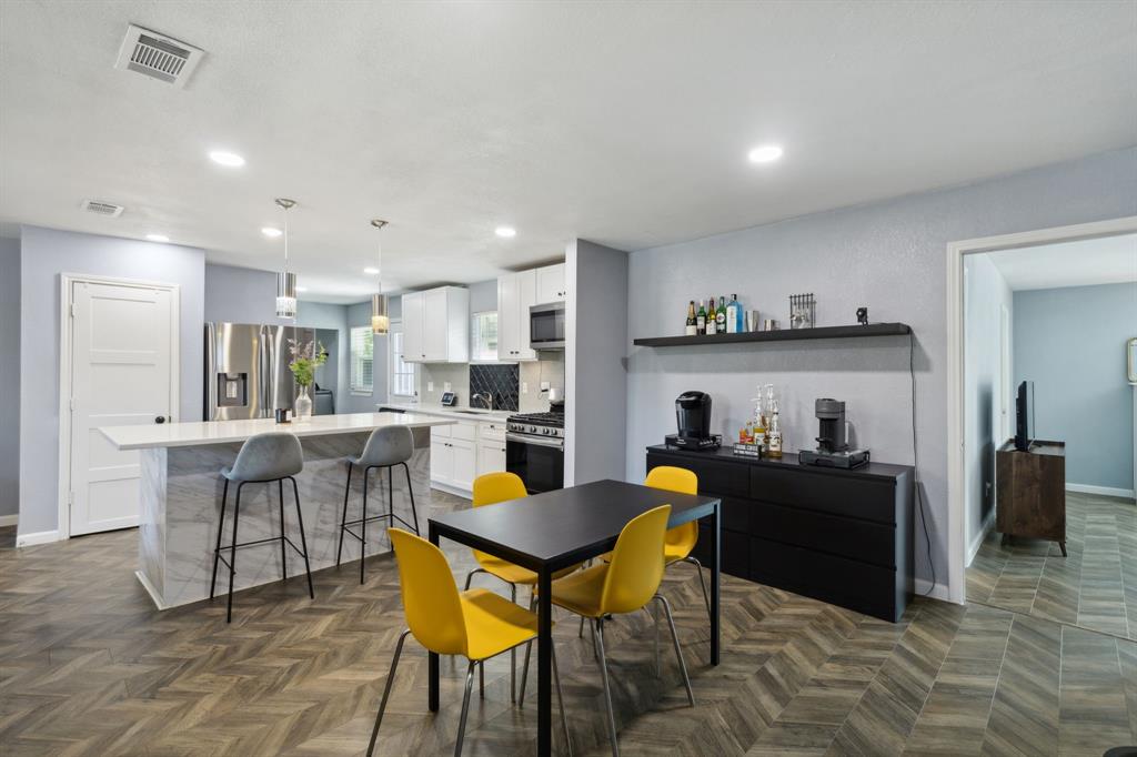2630 Springvale Drive Farmers Branch, TX 75234 - Photo 21 of 25 a view of a dining room with furniture