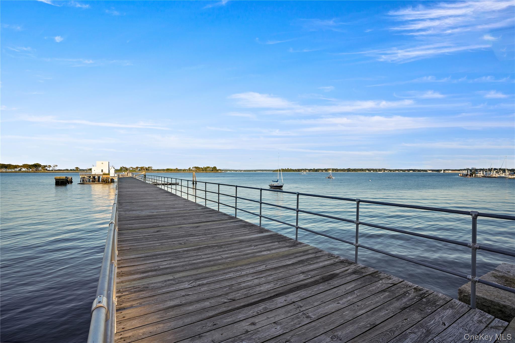 21 Deepwater Way Bronx, NY 10464 - Photo 21 of 27 a view of outdoor space with wooden floor and lake view