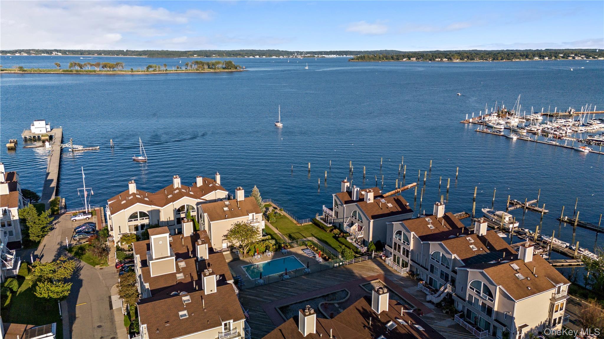 21 Deepwater Way Bronx, NY 10464 - Photo 25 of 27 an aerial view of a house with a lake view