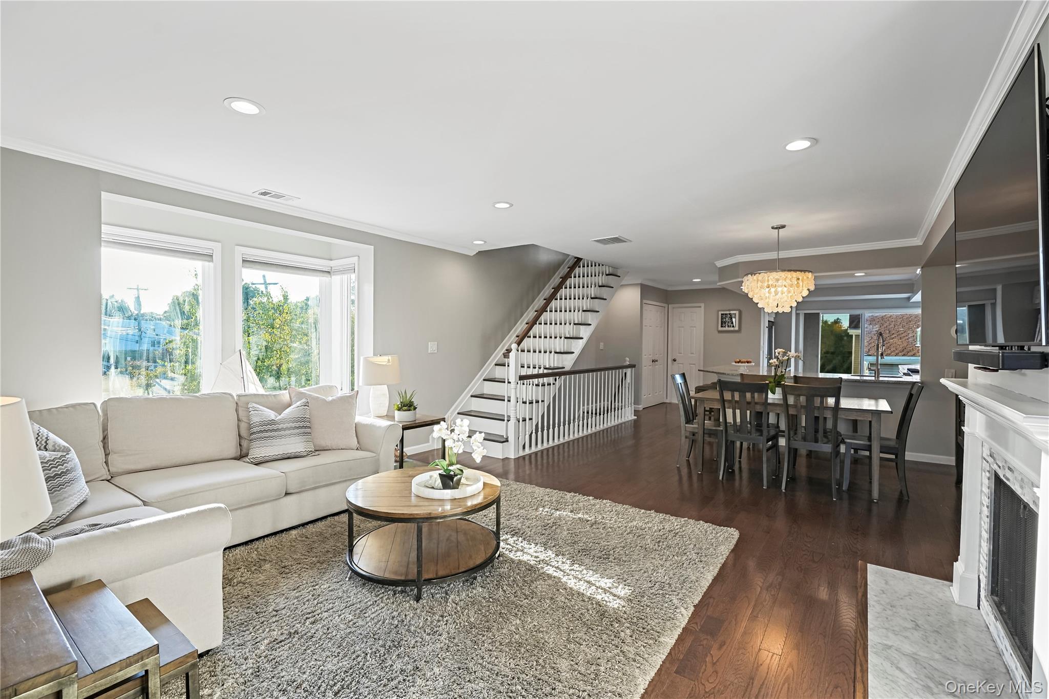 21 Deepwater Way Bronx, NY 10464 - Photo 9 of 27 a living room with furniture and a large window