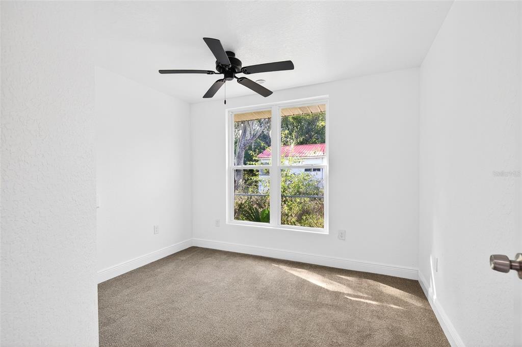 1110 Southwest Fort King Street Ocala, FL 34471 - Photo 23 of 30 an empty room with a window