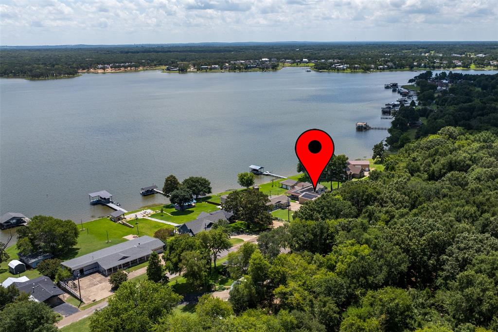 175 Kings Row Malakoff, TX 75148 - Photo 31 of 38 a view of a lake and a building