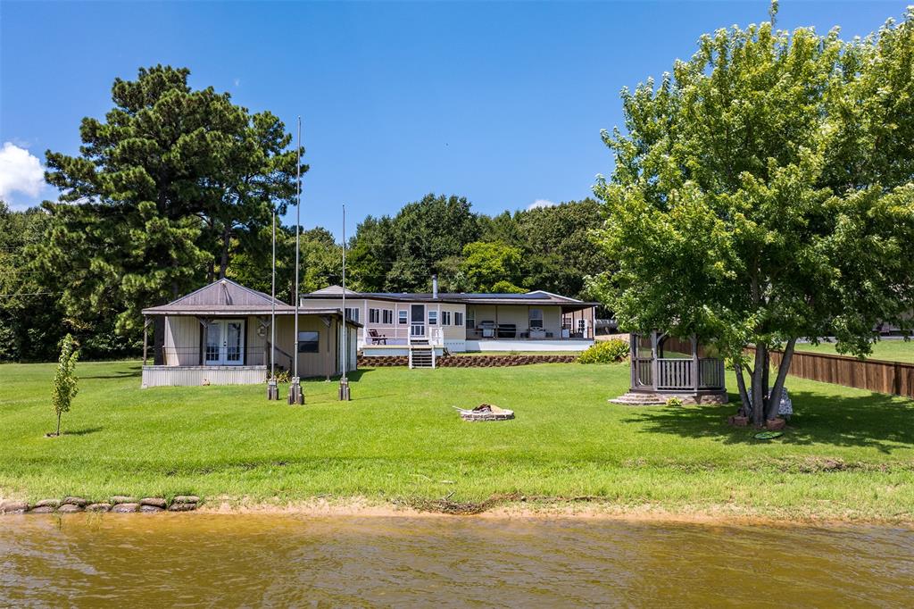175 Kings Row Malakoff, TX 75148 - Photo 33 of 38 a front view of a house with a yard