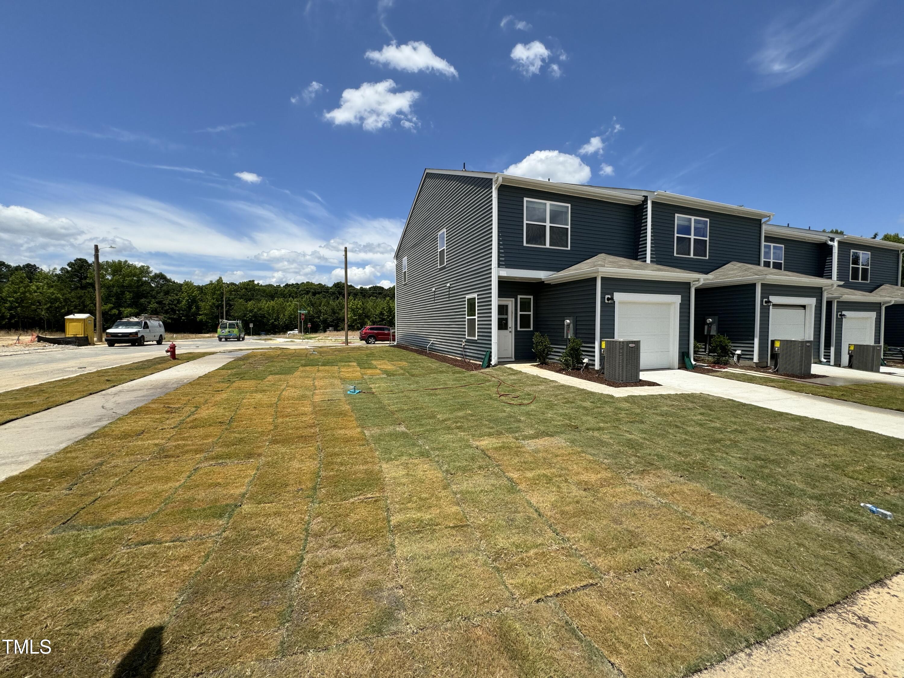 2000 Gln Xing Drive Durham, NC 27704 - Photo 3 of 18 a swimming pool with outdoor seating
