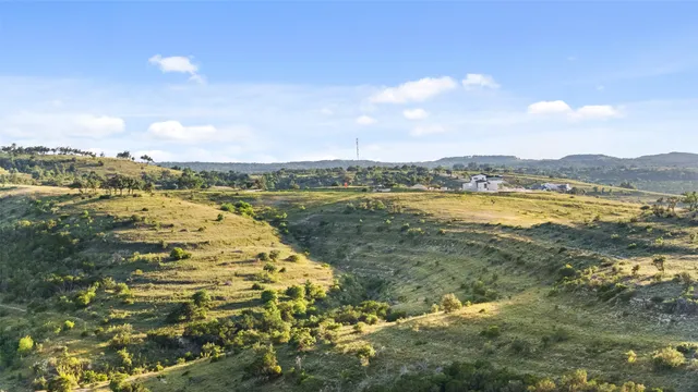 a view of a city street from a balcony