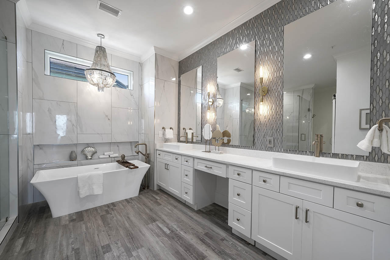 132 Sandprint Circle Destin, FL 32541 - Photo 26 of 117 a spacious bathroom with a double vanity sink a mirror and a bathtub
