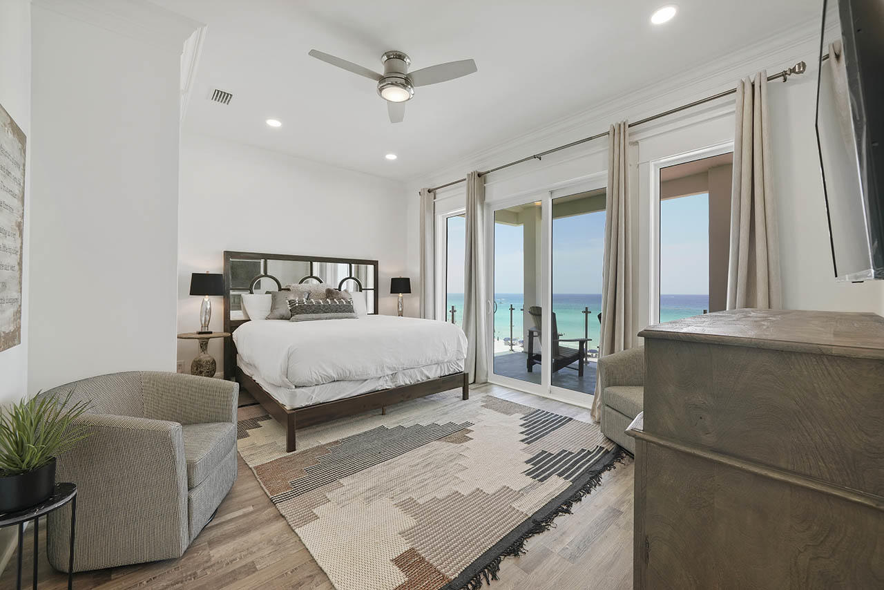 132 Sandprint Circle Destin, FL 32541 - Photo 35 of 117 a bed sitting in a spacious bedroom next to a window