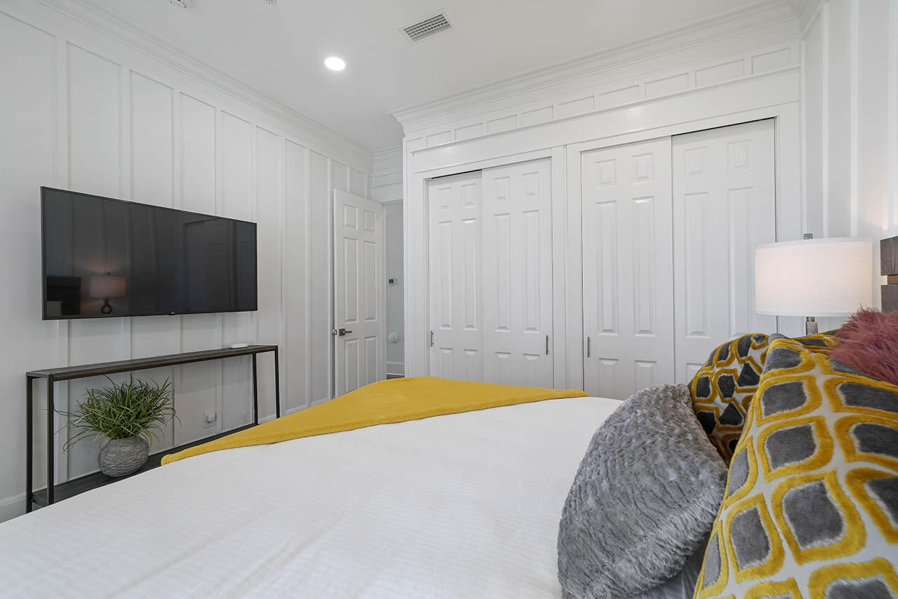 132 Sandprint Circle Destin, FL 32541 - Photo 46 of 117 a bedroom with a bed and a flat screen tv