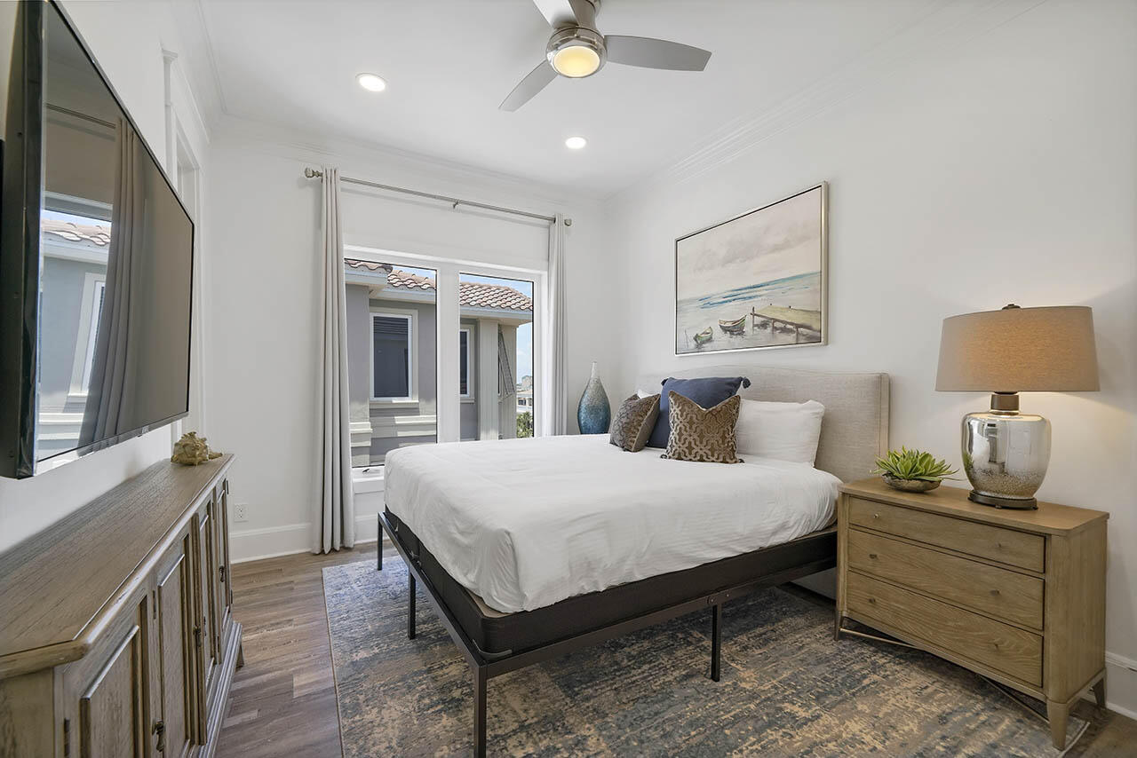 132 Sandprint Circle Destin, FL 32541 - Photo 49 of 117 a bedroom with a bed and a flat screen tv