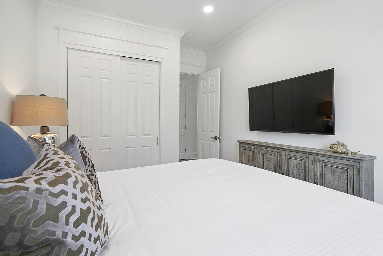 132 Sandprint Circle Destin, FL 32541 - Photo 52 of 117 a bedroom with a bed and a flat screen tv