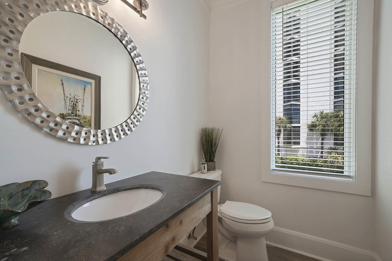 132 Sandprint Circle Destin, FL 32541 - Photo 56 of 117 a bathroom with a toilet a sink and mirror