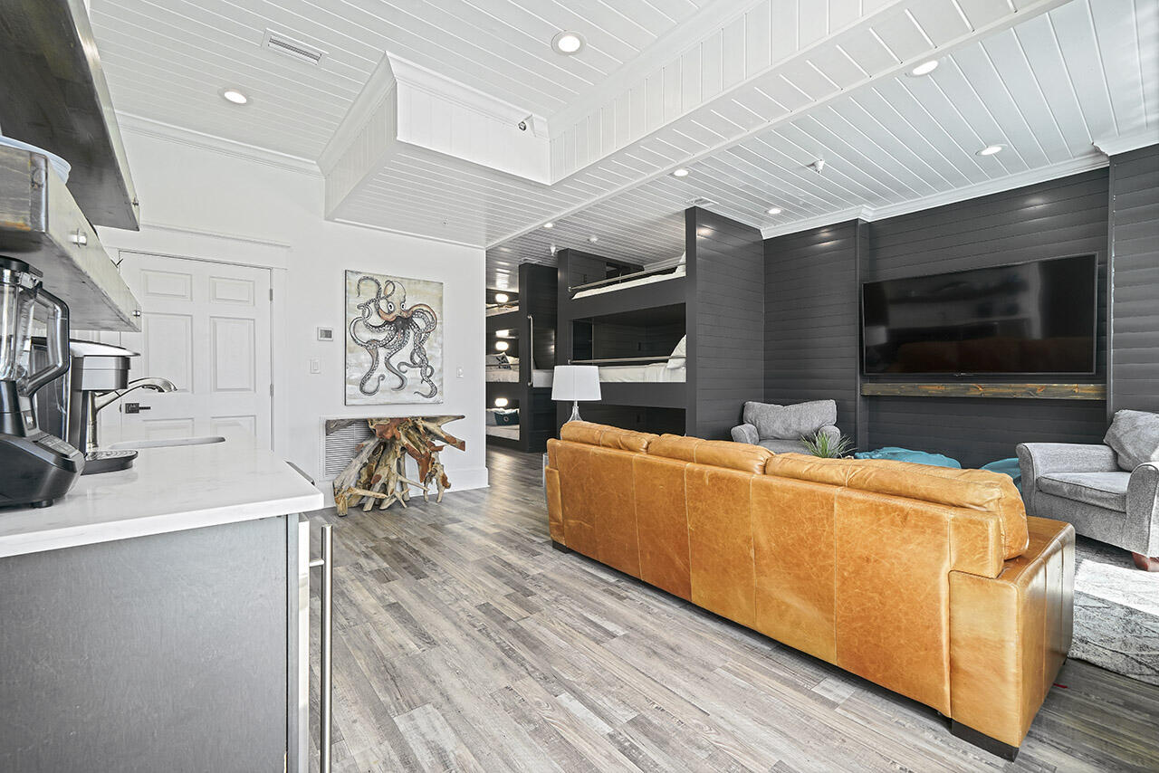 132 Sandprint Circle Destin, FL 32541 - Photo 59 of 117 a living room with furniture and a flat screen tv