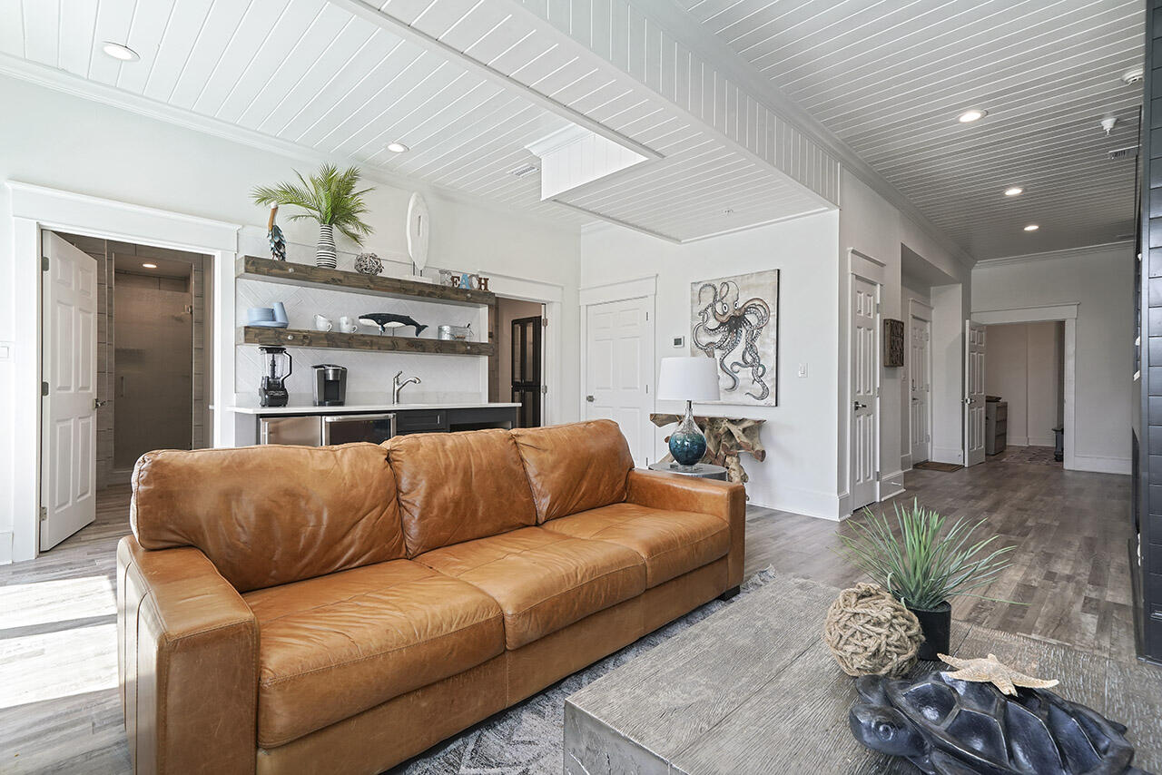 132 Sandprint Circle Destin, FL 32541 - Photo 65 of 117 a living room with furniture flowerpot and a chandelier