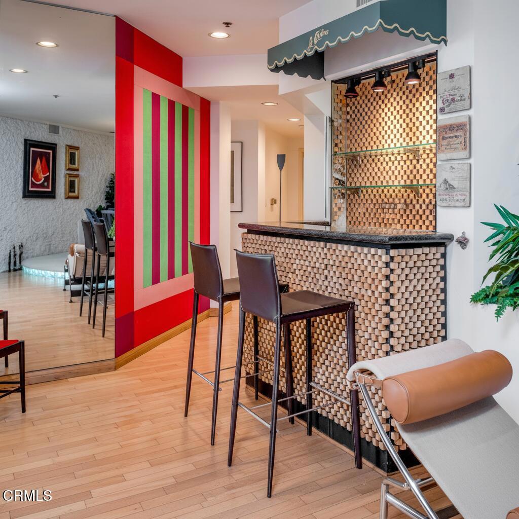 10724 Wilshire Boulevard, Unit 607 Los Angeles, CA 90024 - Photo 14 of 33 a balcony with furniture and a rug
