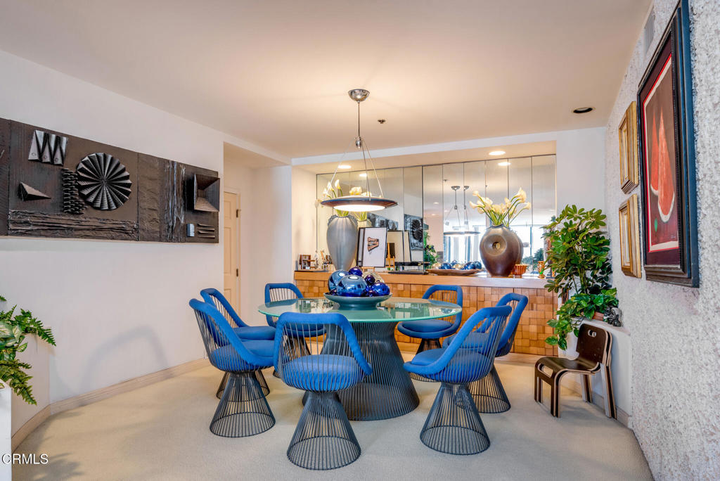 10724 Wilshire Boulevard, Unit 607 Los Angeles, CA 90024 - Photo 15 of 33 a view of a dining room with furniture