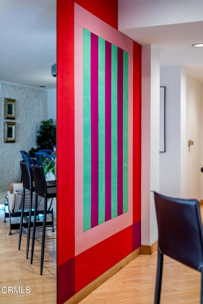 10724 Wilshire Boulevard, Unit 607 Los Angeles, CA 90024 - Photo 29 of 33 a view of a dining room with furniture and wooden floor