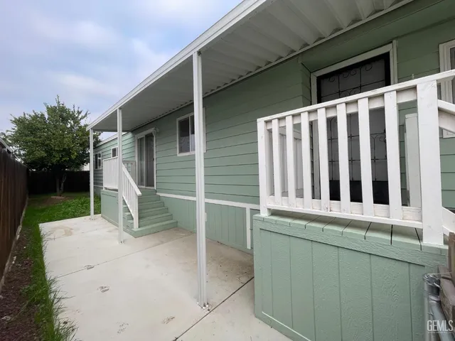 a view of a house with a garage