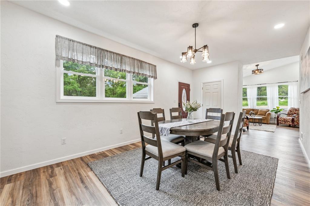 1239 New Stanton Ruffsdale Road Ruffs Dale, PA 15679 - Photo 11 of 47 a view of a dining room with furniture window and outside view